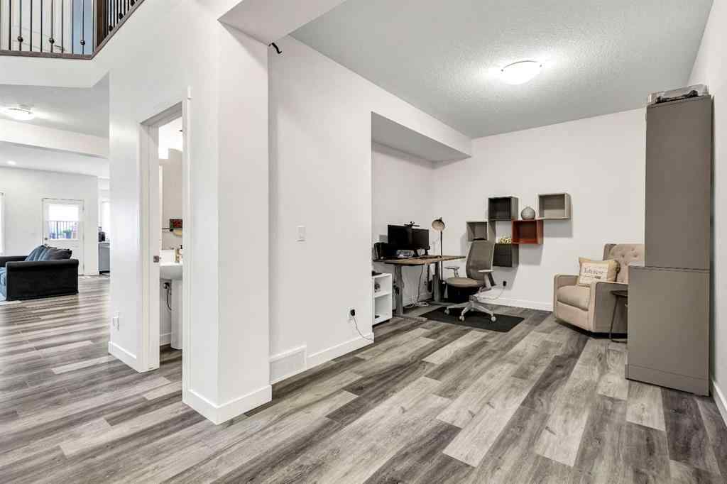 MLS® A2235640 - 890 Bluerock Way SW in Alpine Park Calgary, Residential
