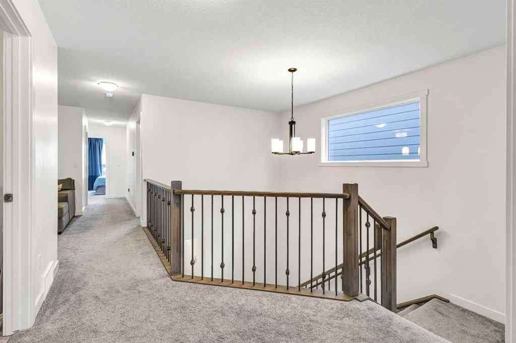 MLS® A2235640 - 890 Bluerock Way SW in Alpine Park Calgary, Residential
