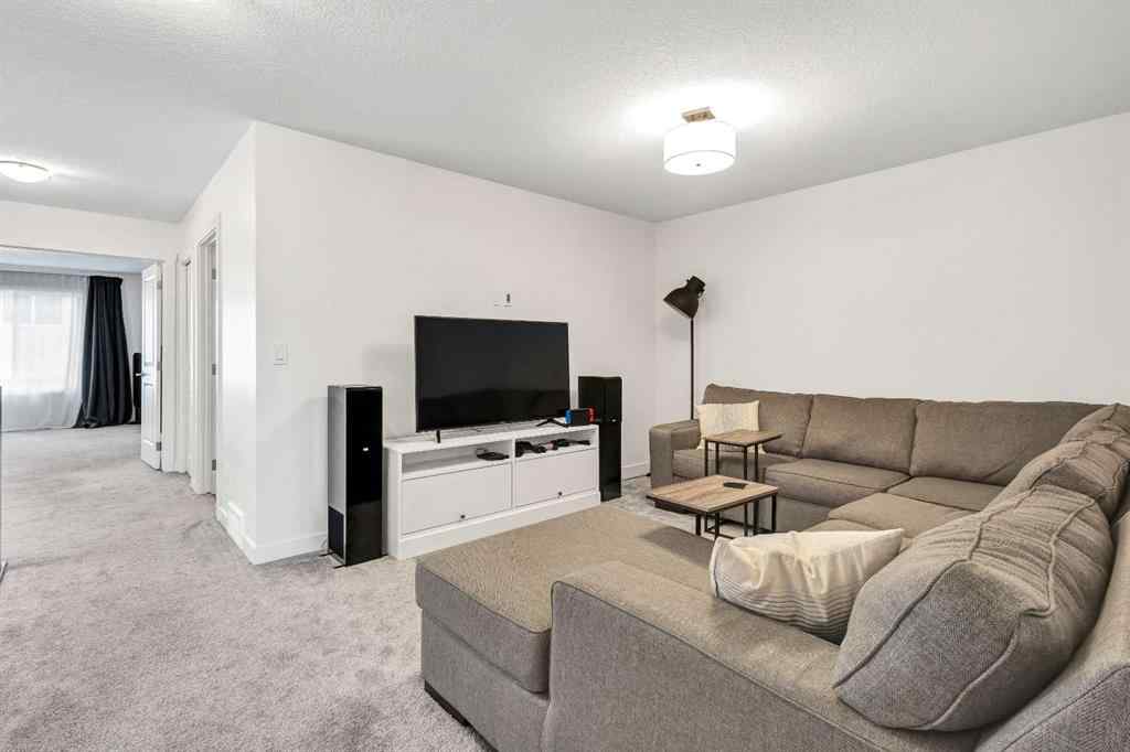 MLS® A2235640 - 890 Bluerock Way SW in Alpine Park Calgary, Residential