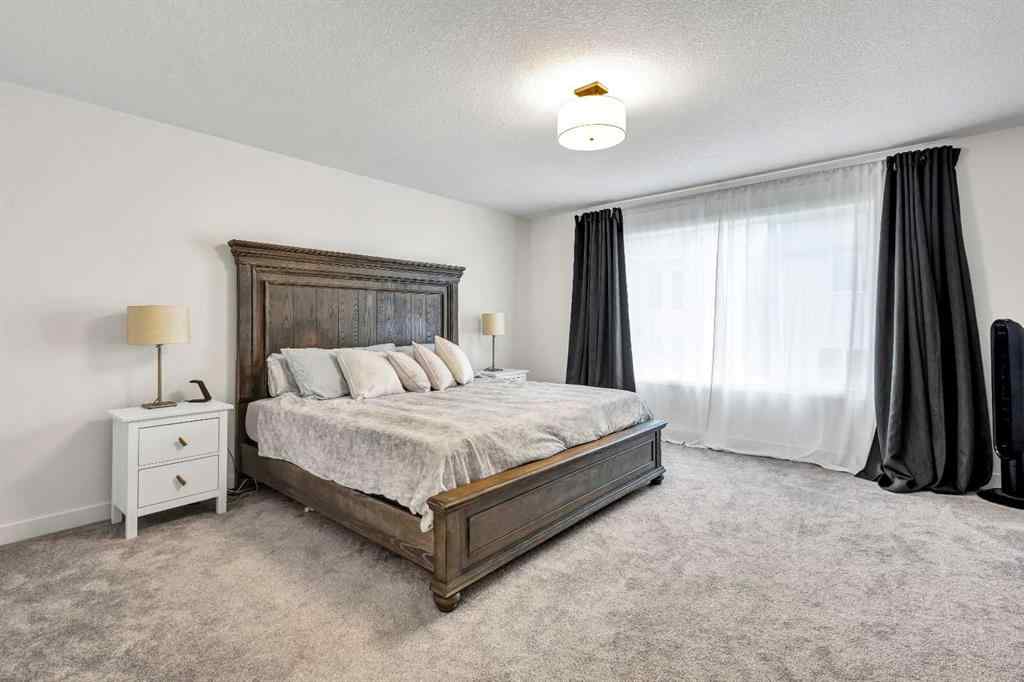 MLS® A2235640 - 890 Bluerock Way SW in Alpine Park Calgary, Residential