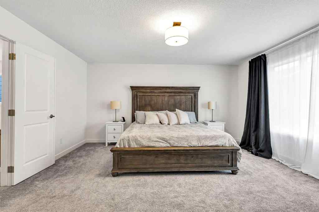 MLS® A2235640 - 890 Bluerock Way SW in Alpine Park Calgary, Residential