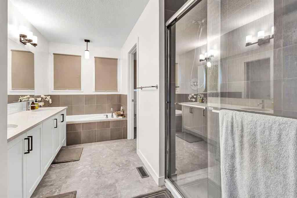 MLS® A2235640 - 890 Bluerock Way SW in Alpine Park Calgary, Residential