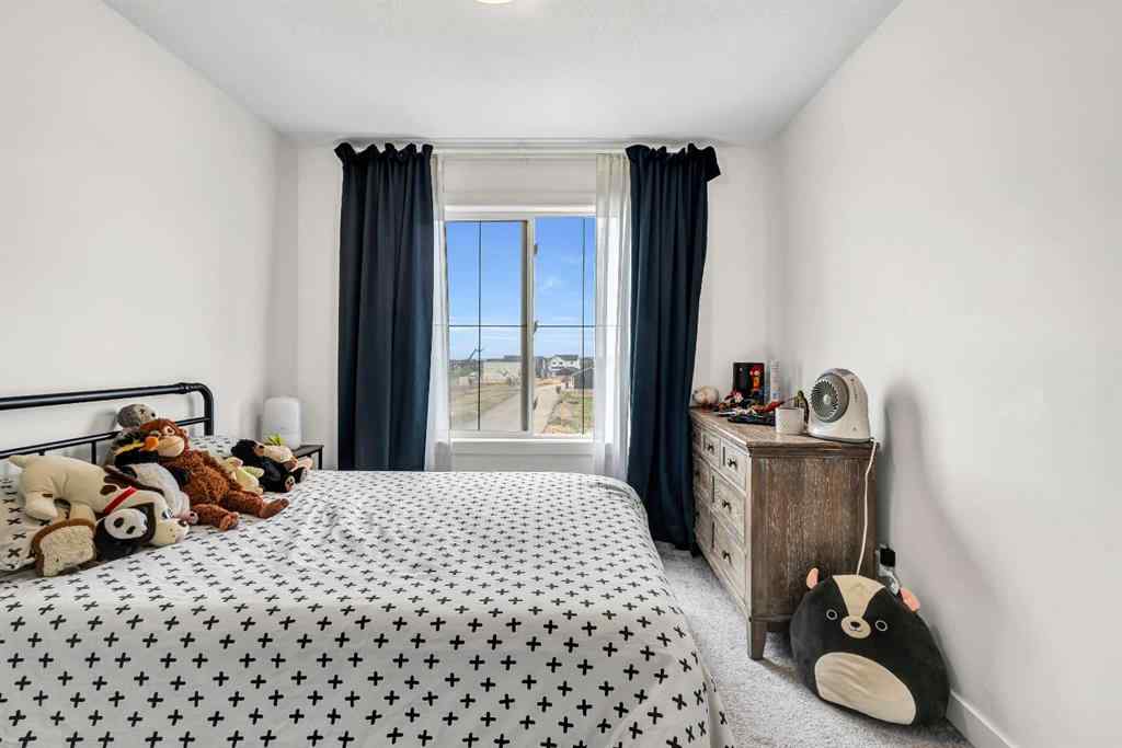 MLS® A2235640 - 890 Bluerock Way SW in Alpine Park Calgary, Residential