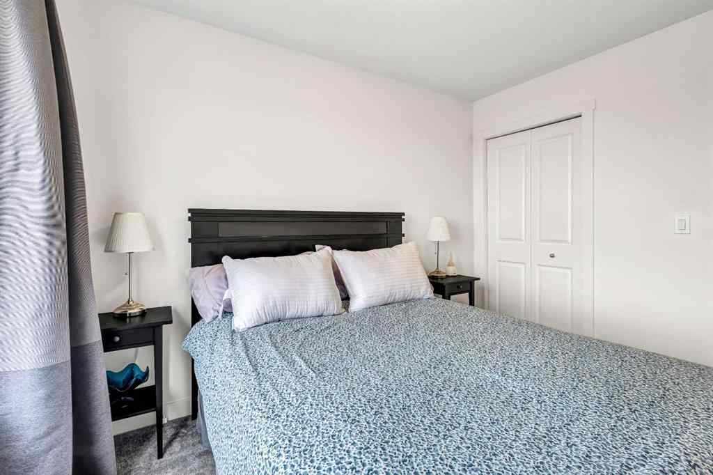 MLS® A2235640 - 890 Bluerock Way SW in Alpine Park Calgary, Residential