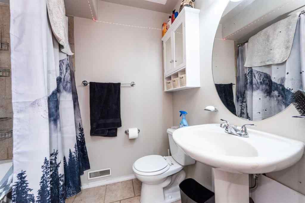 MLS® A2235682 - 214 Erin Circle SE in Erin Woods Calgary, Residential
