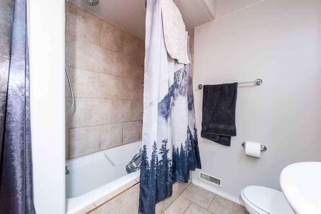 MLS® A2235682 - 214 Erin Circle SE in Erin Woods Calgary, Residential