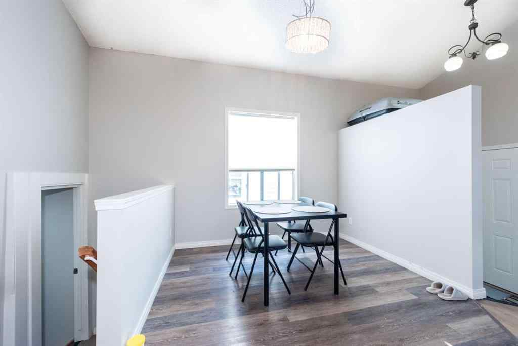 MLS® A2235682 - 214 Erin Circle SE in Erin Woods Calgary, Residential