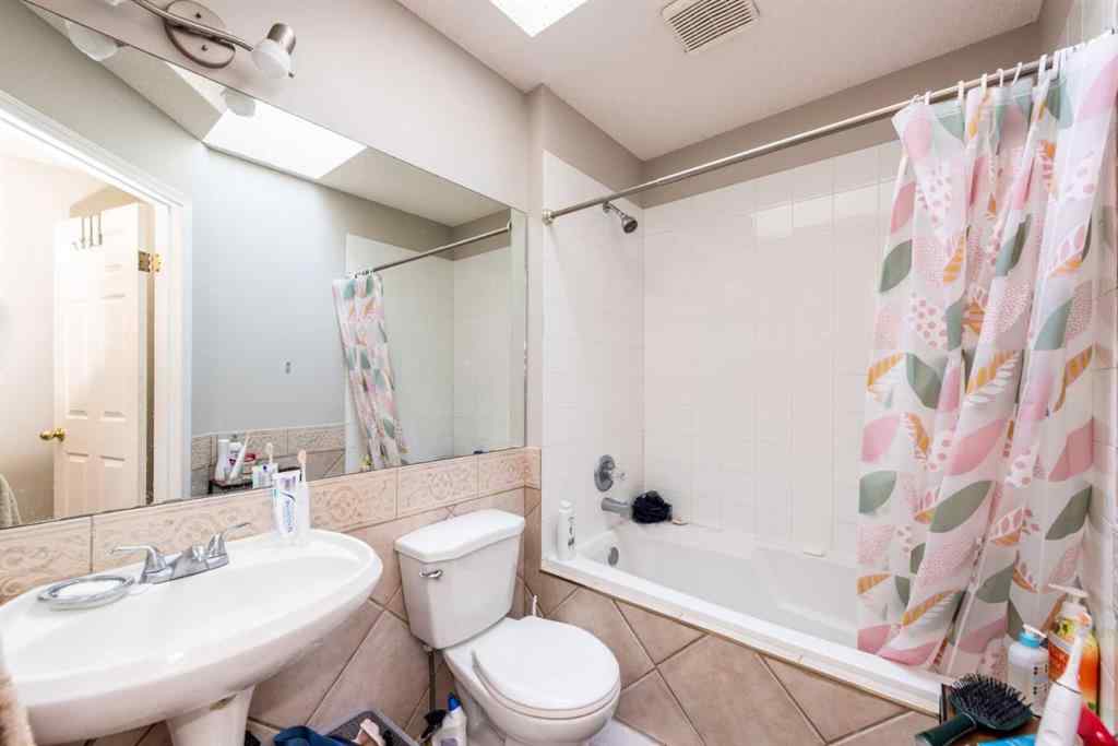 MLS® A2235682 - 214 Erin Circle SE in Erin Woods Calgary, Residential