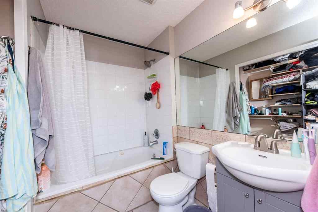 MLS® A2235682 - 214 Erin Circle SE in Erin Woods Calgary, Residential