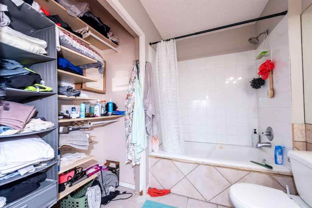 MLS® A2235682 - 214 Erin Circle SE in Erin Woods Calgary, Residential