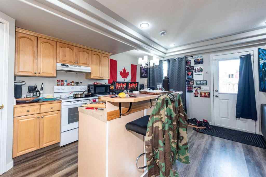 MLS® A2235682 - 214 Erin Circle SE in Erin Woods Calgary, Residential