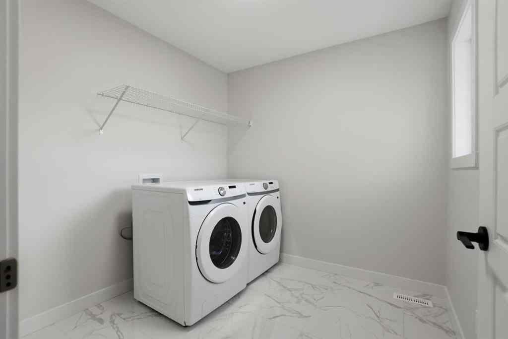 MLS&reg; # A2235706 - 719 Buffaloberry Manor SE in Ricardo Ranch Calgary, Residential Open Houses