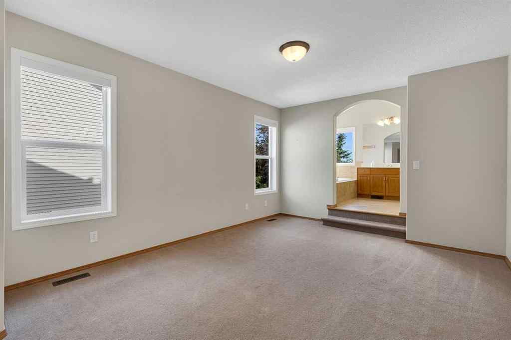MLS® A2235777 - 115 Cougarstone Court SW in Cougar Ridge Calgary, Residential