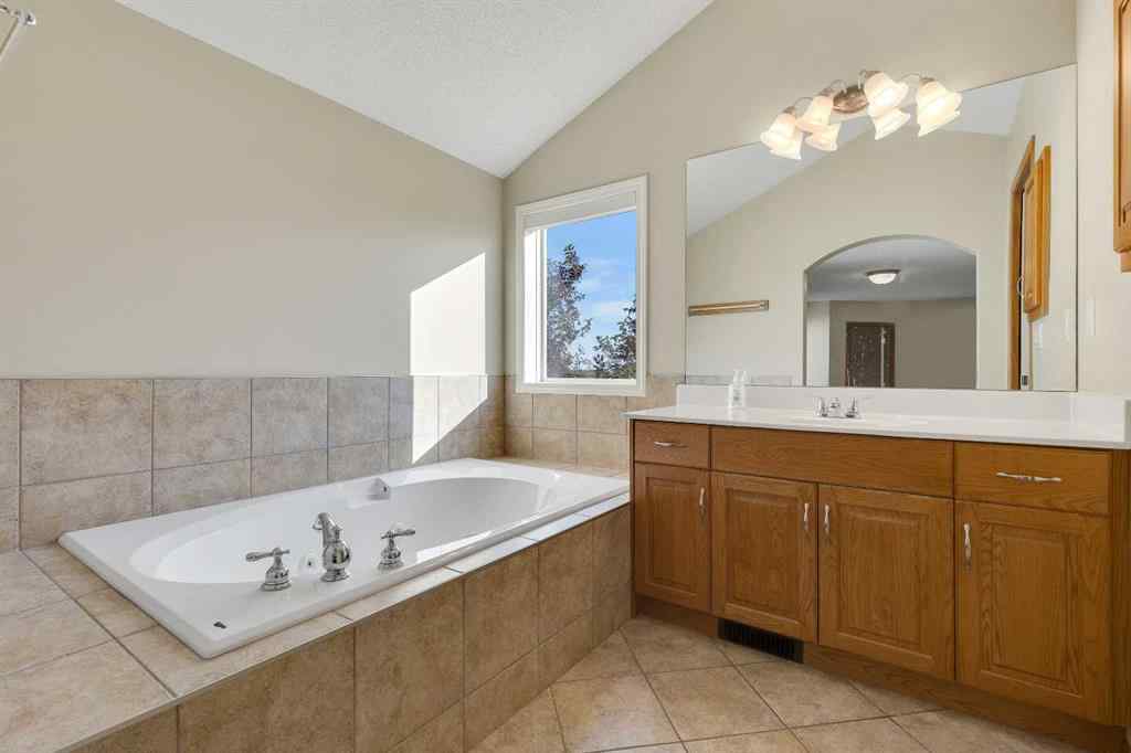 MLS® A2235777 - 115 Cougarstone Court SW in Cougar Ridge Calgary, Residential