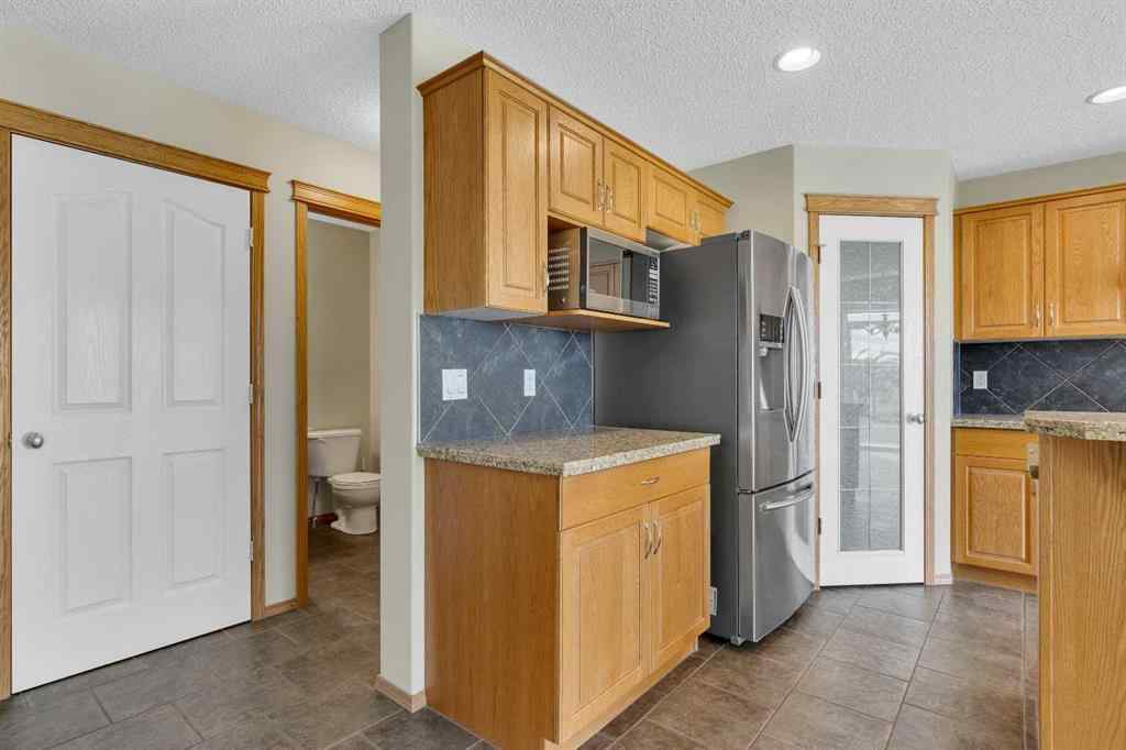 MLS® A2235777 - 115 Cougarstone Court SW in Cougar Ridge Calgary, Residential