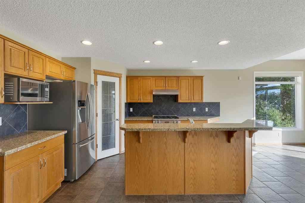 MLS® A2235777 - 115 Cougarstone Court SW in Cougar Ridge Calgary, Residential