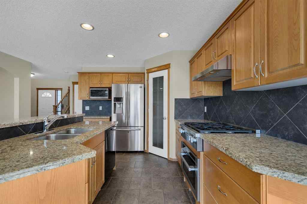 MLS® A2235777 - 115 Cougarstone Court SW in Cougar Ridge Calgary, Residential