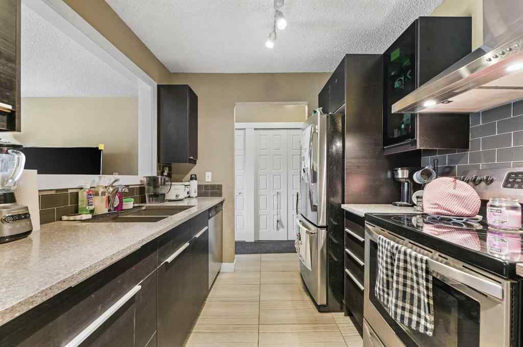 MLS® A2235803 - Unit #403 1113 37 Street SW in Rosscarrock Calgary, Residential