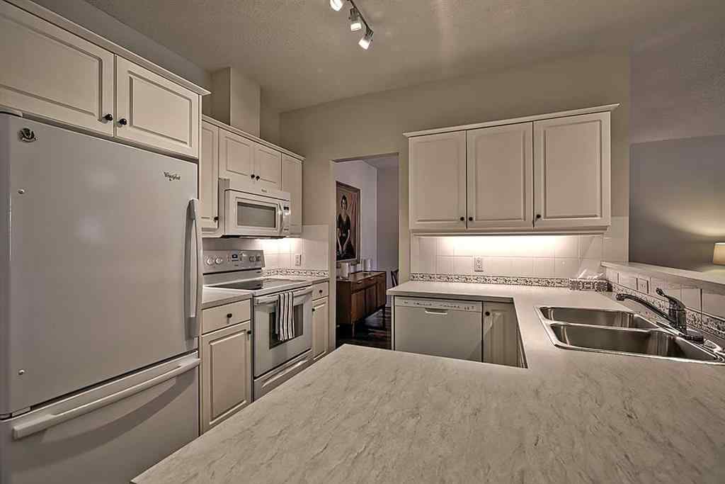 MLS® A2235878 - Unit #105 2144 Paliswood Road SW in Palliser Calgary, Residential