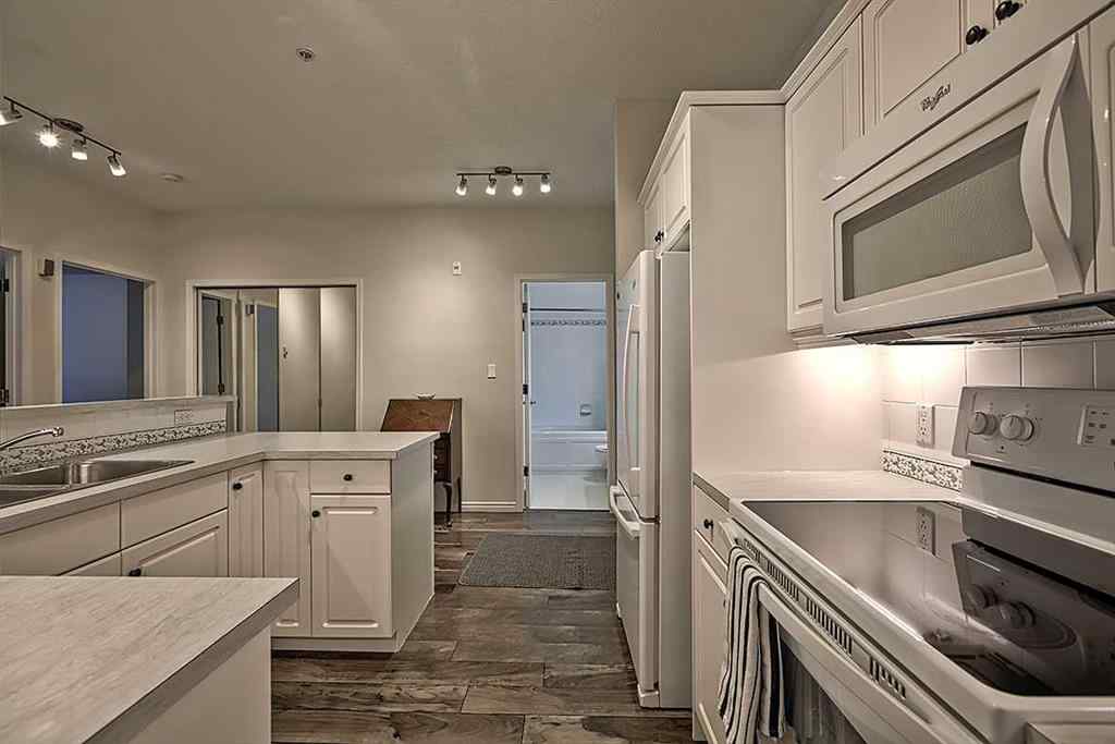 MLS® A2235878 - Unit #105 2144 Paliswood Road SW in Palliser Calgary, Residential
