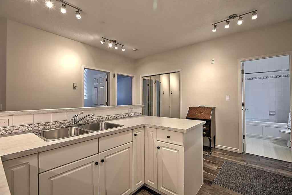 MLS® A2235878 - Unit #105 2144 Paliswood Road SW in Palliser Calgary, Residential