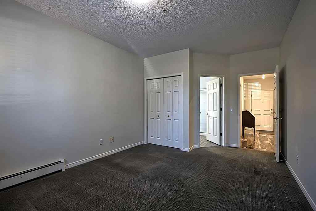 MLS® A2235878 - Unit #105 2144 Paliswood Road SW in Palliser Calgary, Residential