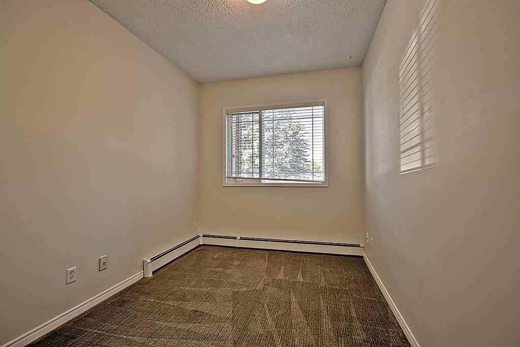 MLS® A2235878 - Unit #105 2144 Paliswood Road SW in Palliser Calgary, Residential