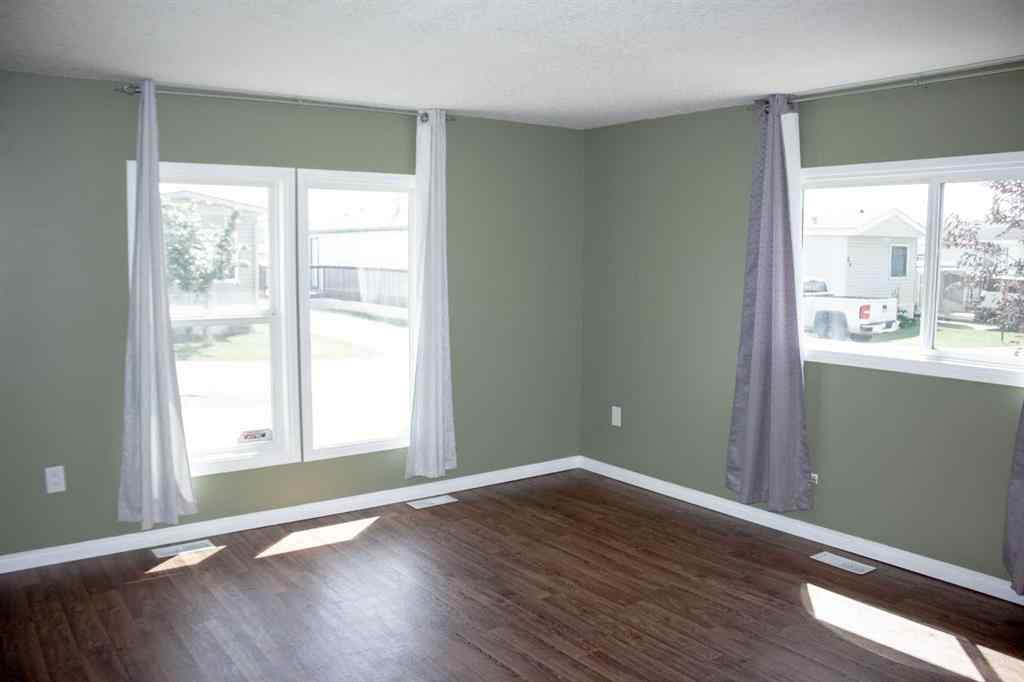 MLS® A2235890 - 53 Coachman Village   in MH - Coachman Grande Prairie, Mobile