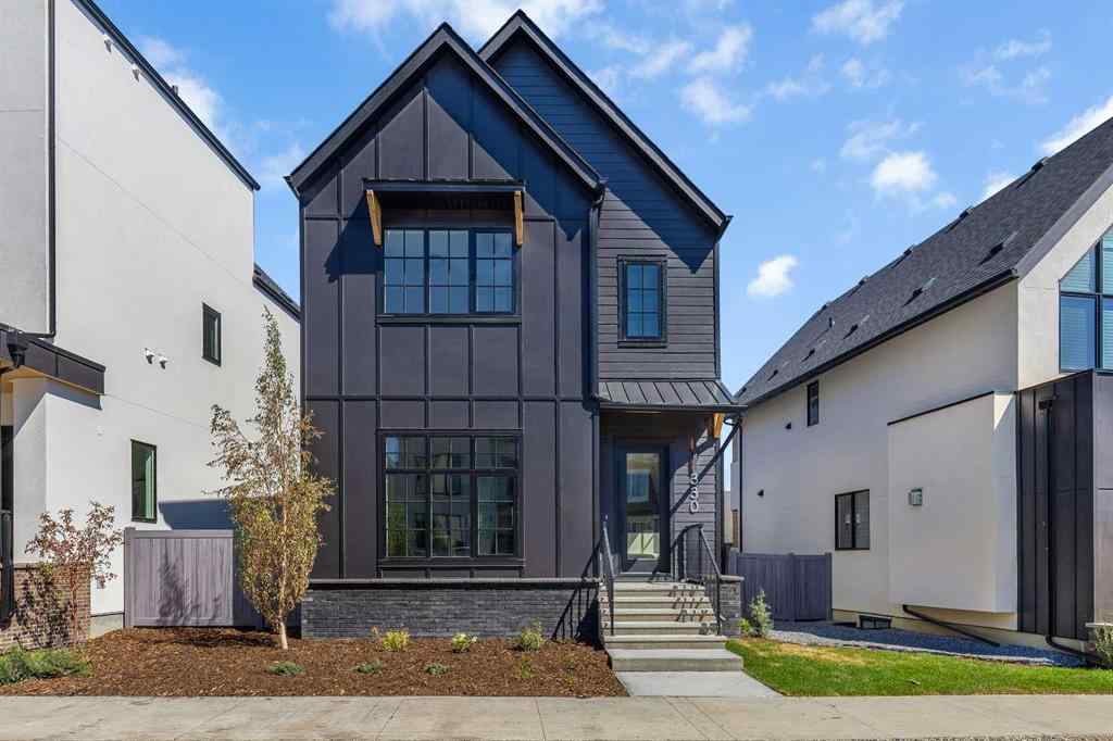 MLS® A2235923 - 330 Normandy Drive SW in Currie Barracks Calgary, Residential