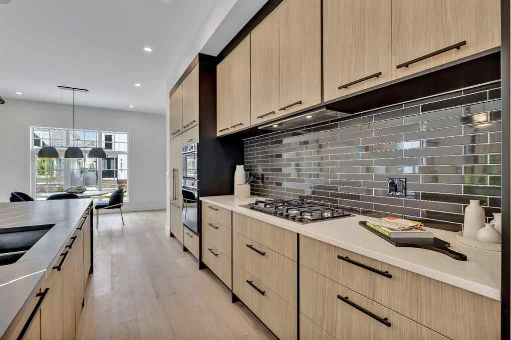 MLS® A2235923 - 330 Normandy Drive SW in Currie Barracks Calgary, Residential
