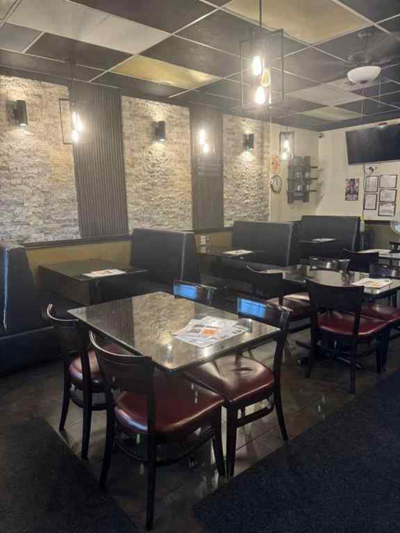 MLS® A2235927 - Unit #104 3400 14 Street NW in Rosemont Calgary, Commercial