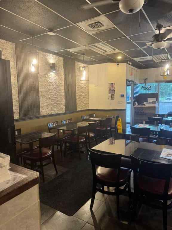 MLS® A2235927 - Unit #104 3400 14 Street NW in Rosemont Calgary, Commercial