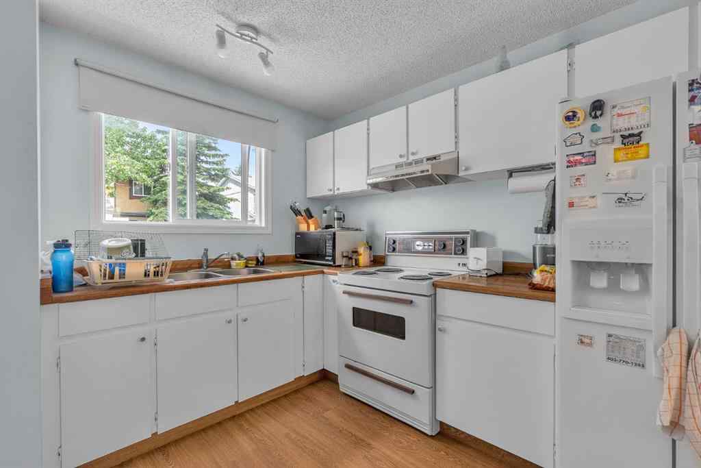 MLS® A2235961 - 218 Pinemeadow Road NE in Pineridge Calgary, Residential