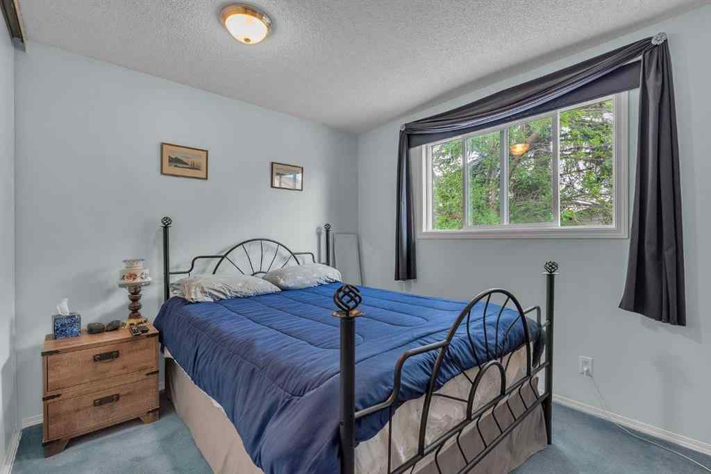 MLS® A2235961 - 218 Pinemeadow Road NE in Pineridge Calgary, Residential