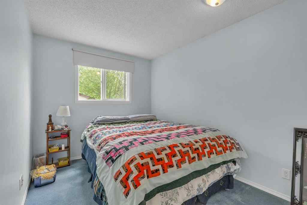 MLS® A2235961 - 218 Pinemeadow Road NE in Pineridge Calgary, Residential
