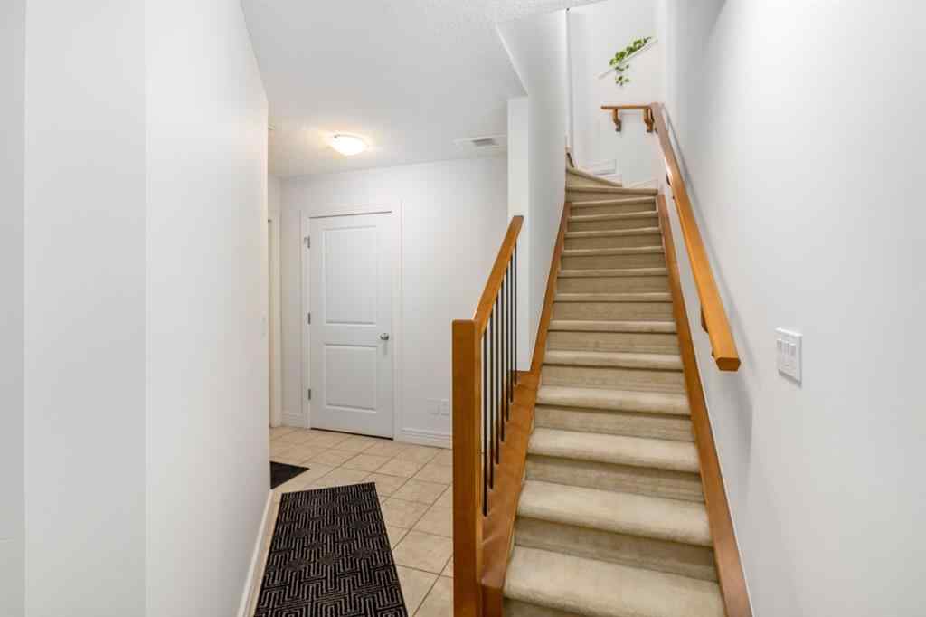 MLS® A2235988 - Unit #7 156 Rockyledge View NW in Rocky Ridge Calgary, Residential