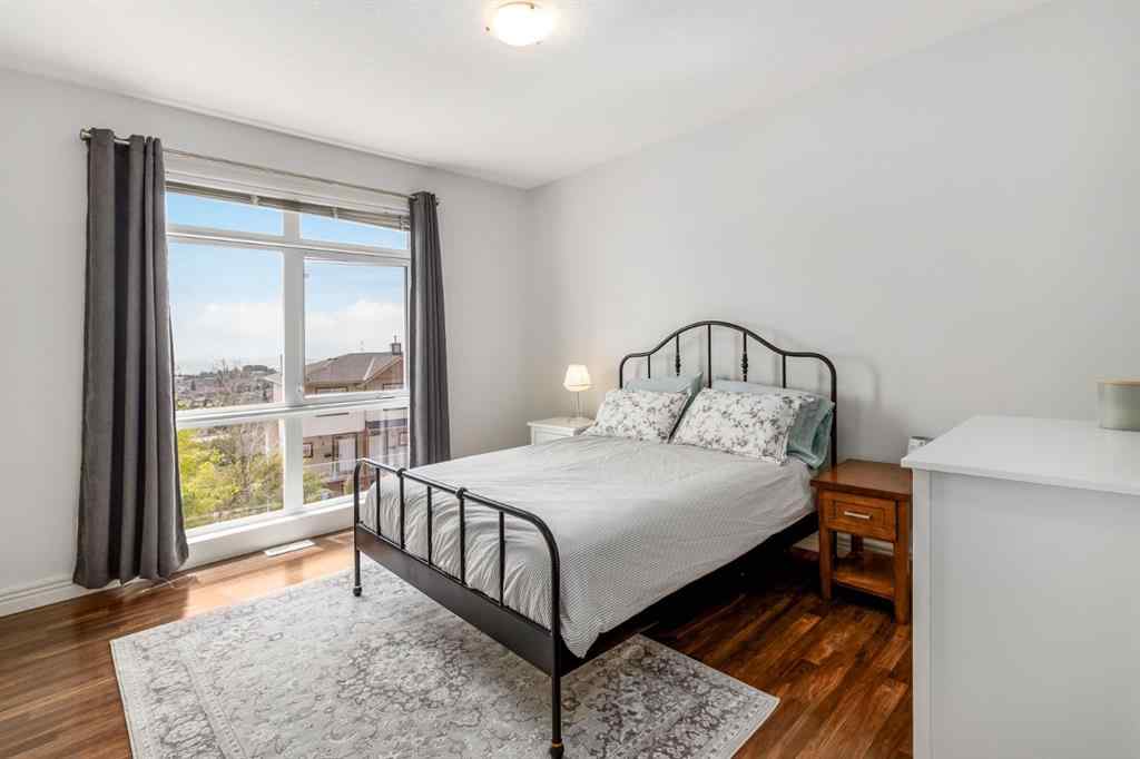 MLS® A2235988 - Unit #7 156 Rockyledge View NW in Rocky Ridge Calgary, Residential