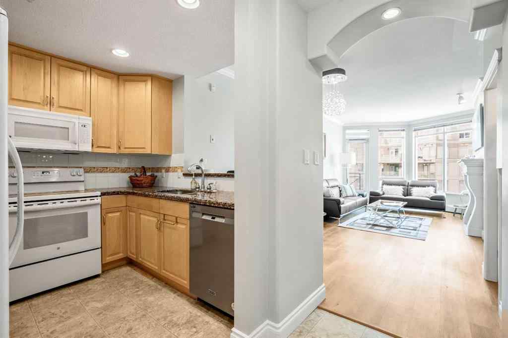 MLS® A2236029 - Unit #703 1718 14 Avenue NW in Hounsfield Heights/Briar Hill Calgary, Residential