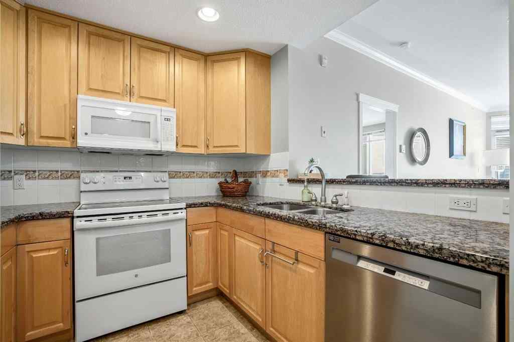 MLS® A2236029 - Unit #703 1718 14 Avenue NW in Hounsfield Heights/Briar Hill Calgary, Residential