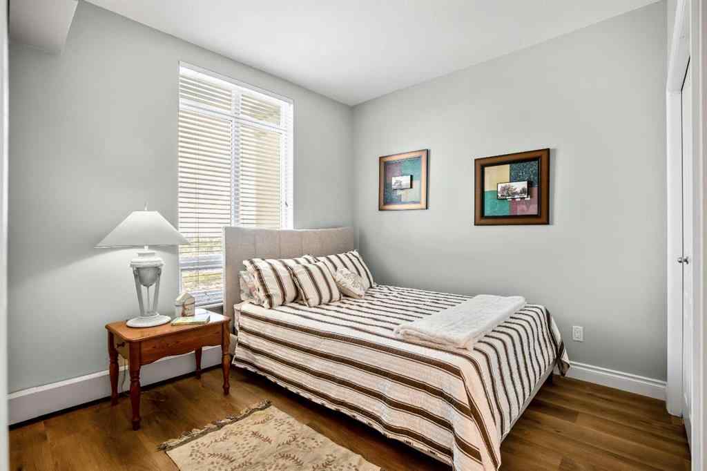 MLS® A2236029 - Unit #703 1718 14 Avenue NW in Hounsfield Heights/Briar Hill Calgary, Residential