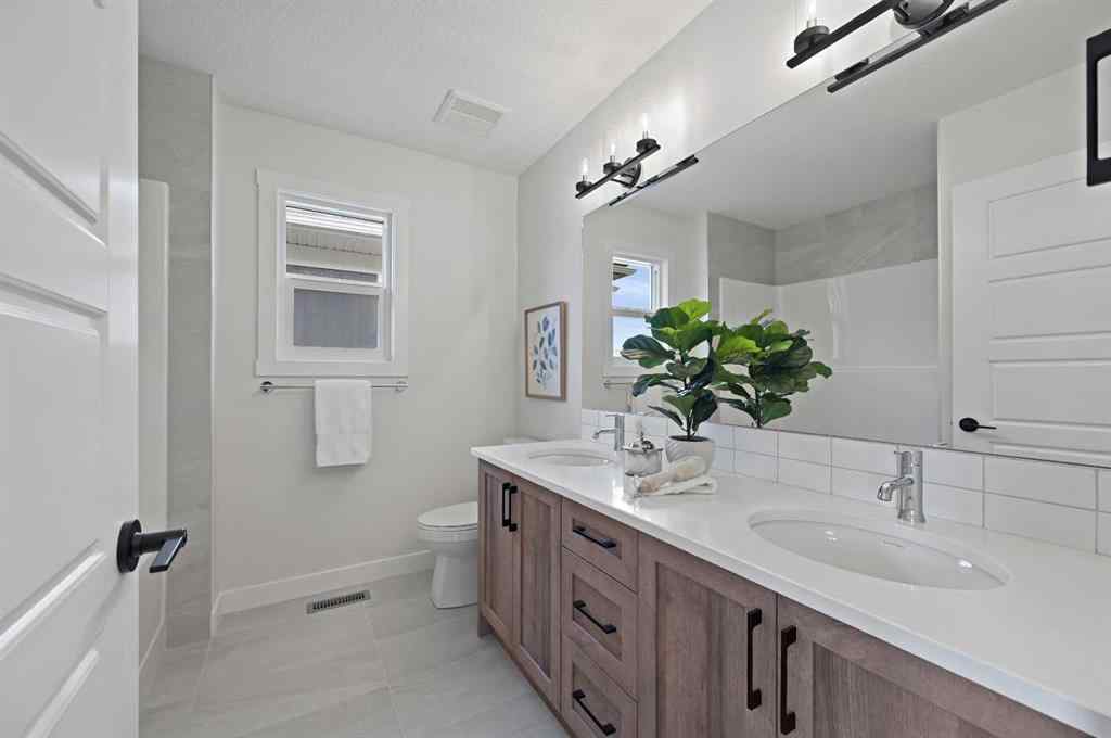 MLS® A2236064 - 564 Baywater Manor SW in Bayside Airdrie, Residential