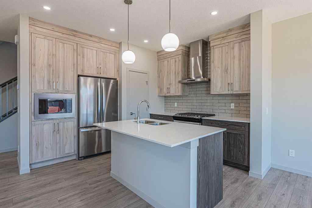 MLS® A2236067 - 914 Bayview Heights SW in Bayview Airdrie, Residential