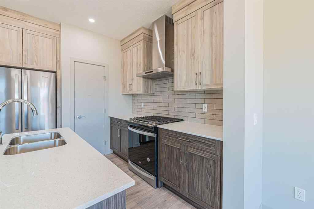 MLS® A2236067 - 914 Bayview Heights SW in Bayview Airdrie, Residential