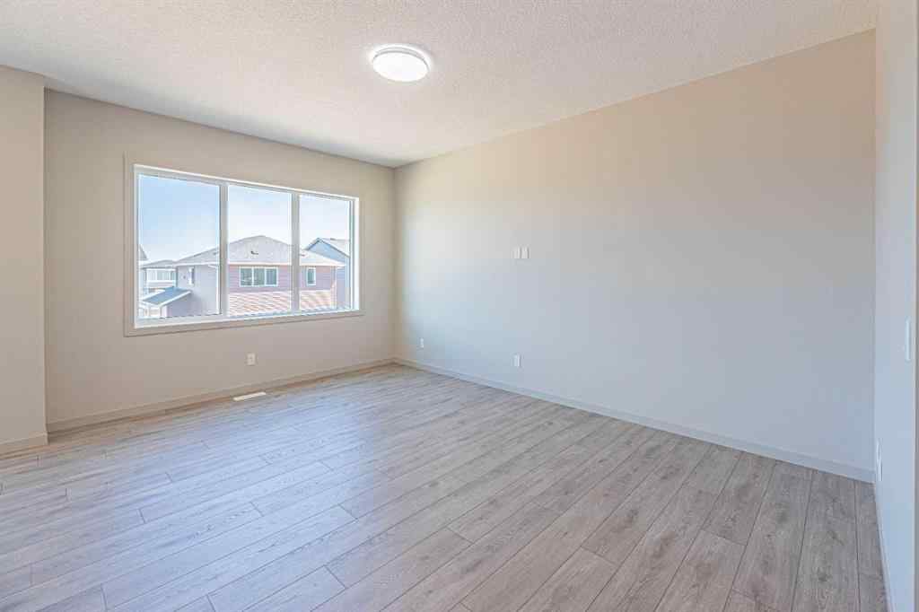 MLS® A2236067 - 914 Bayview Heights SW in Bayview Airdrie, Residential