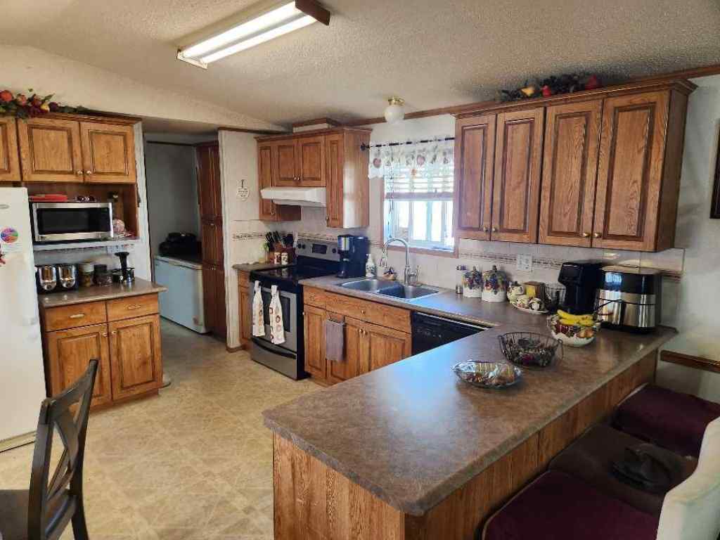 MLS® A2236151 - 46 5812 Street NW in NONE High Prairie, Residential
