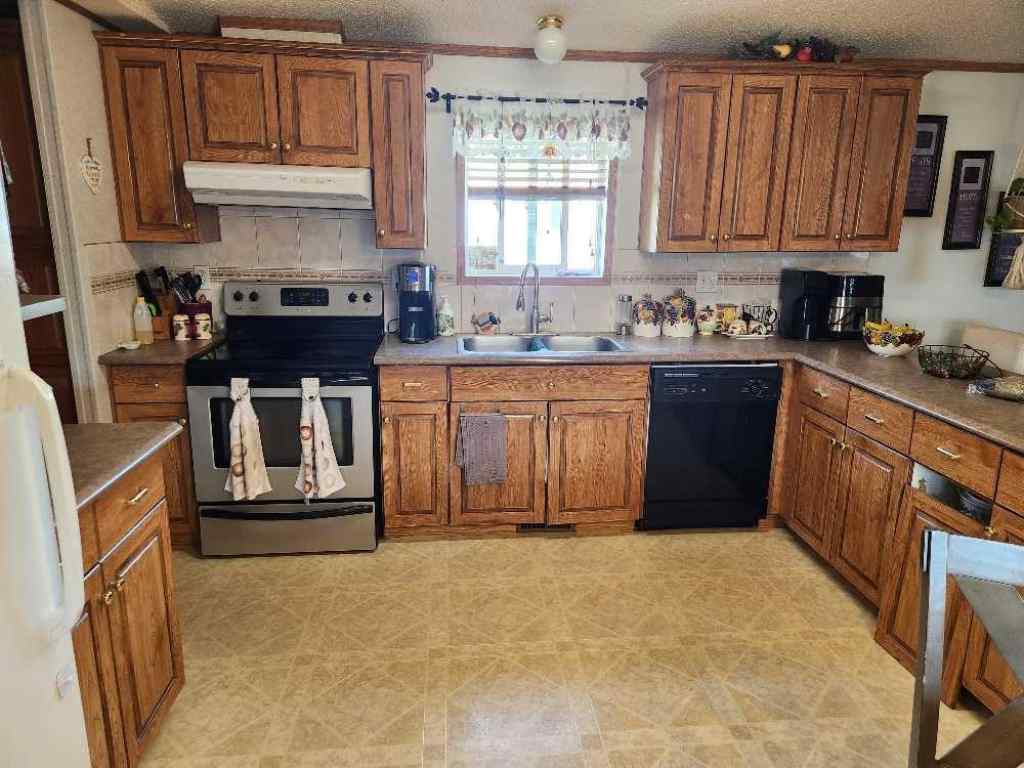 MLS® A2236151 - 46 5812 Street NW in NONE High Prairie, Residential