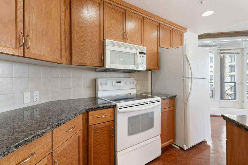 MLS® A2236219 - Unit #408 1726 14 Avenue NW in Hounsfield Heights/Briar Hill Calgary, Residential