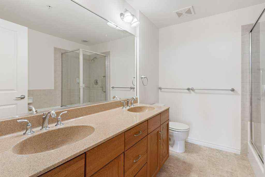MLS® A2236219 - Unit #408 1726 14 Avenue NW in Hounsfield Heights/Briar Hill Calgary, Residential
