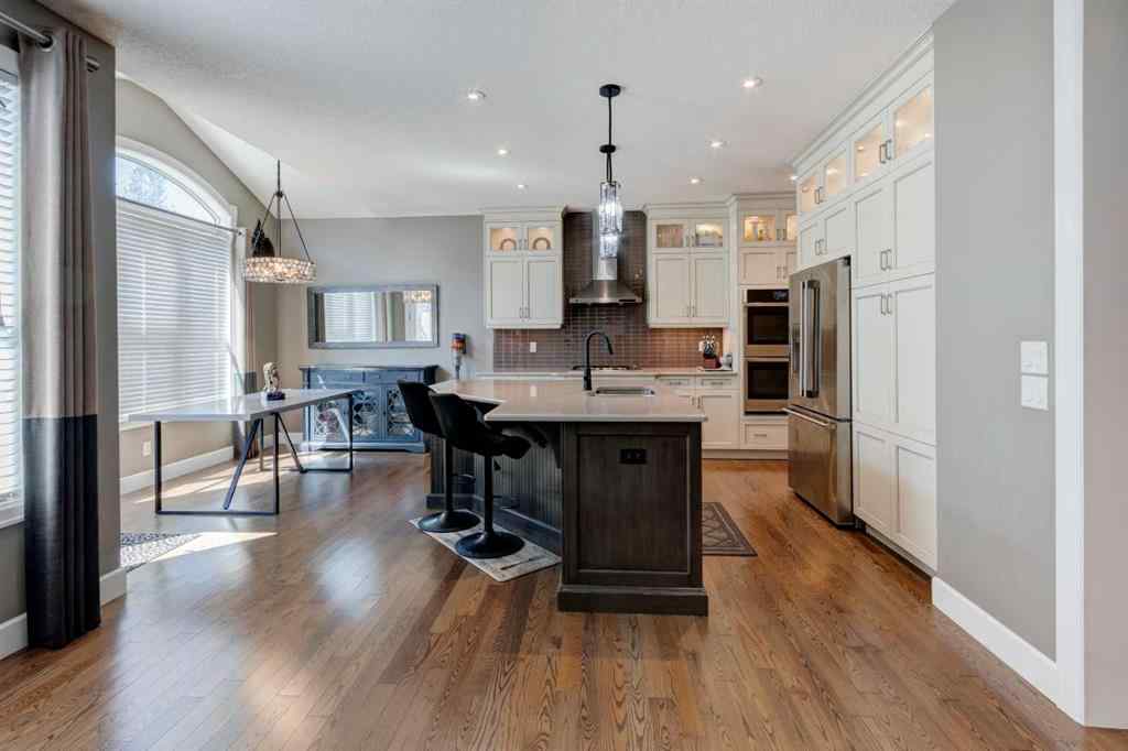 MLS® A2236330 - 923 Windsong Drive SW in Windsong Airdrie, Residential