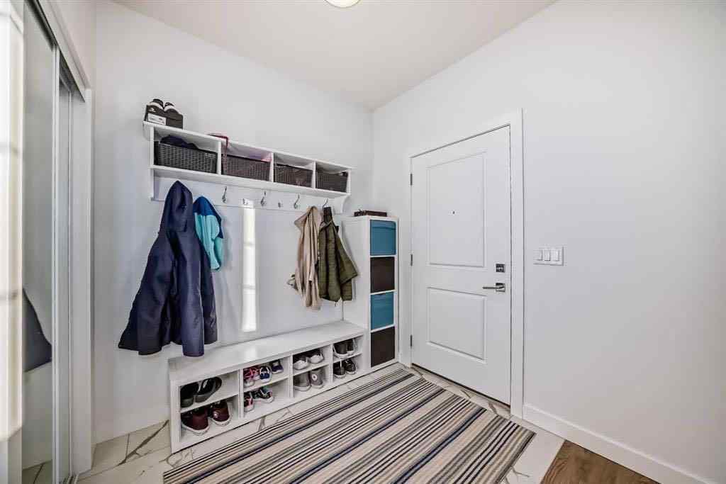 MLS® A2236352 - 144 Merganser Drive W in Dawson\'s Landing Chestermere, Residential